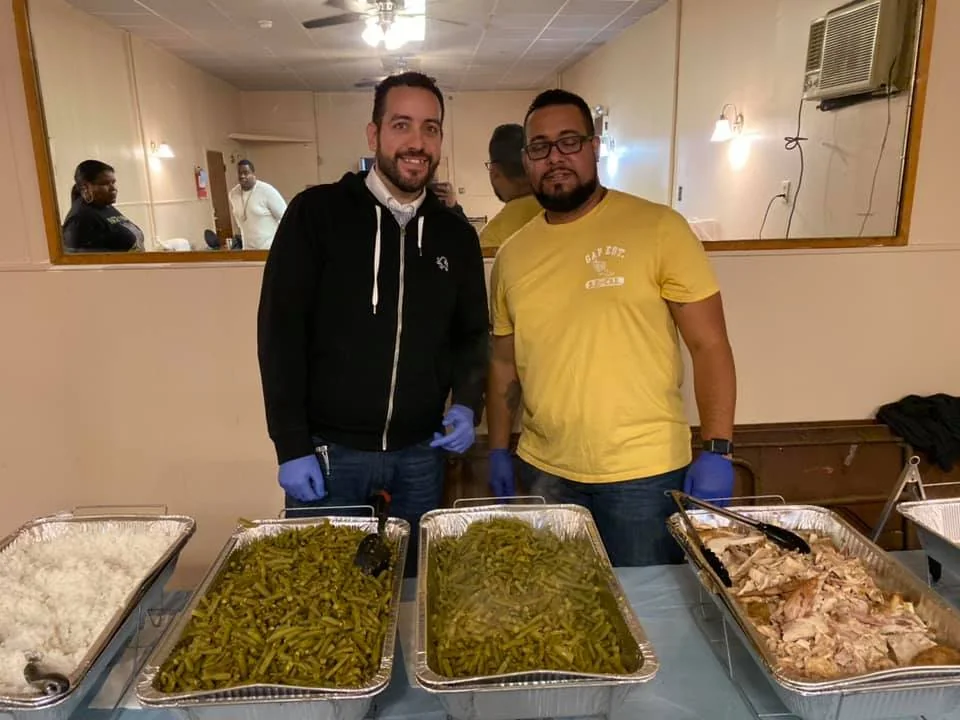 Gabriel Franco helping deliver hot meals with Prince Hall Lodge No. 27