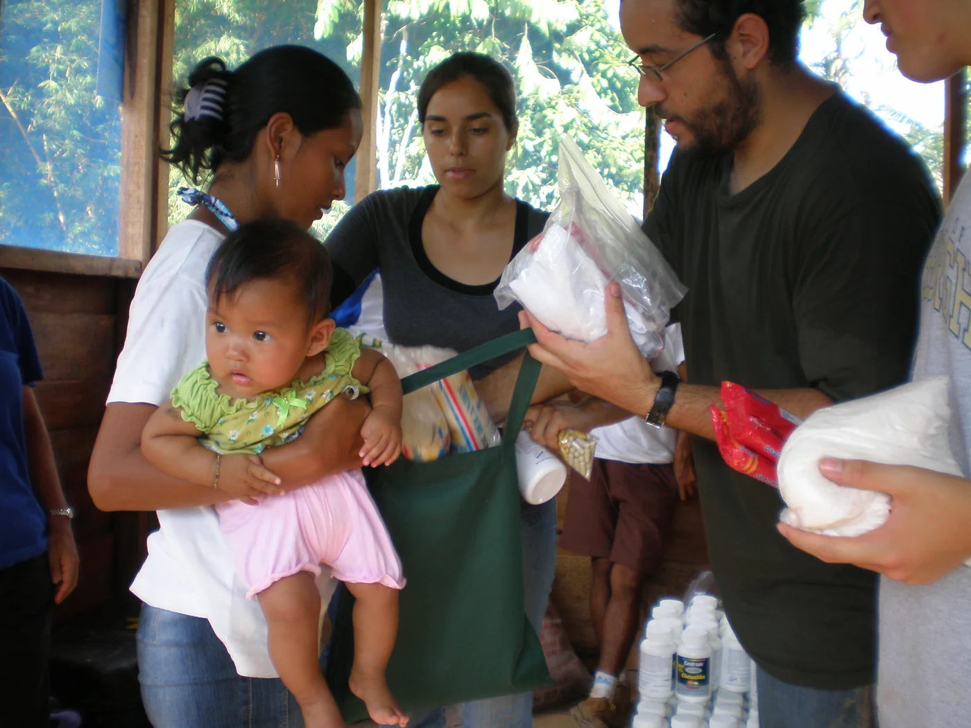 Gabriel Franco helping distribute supplies in Peru