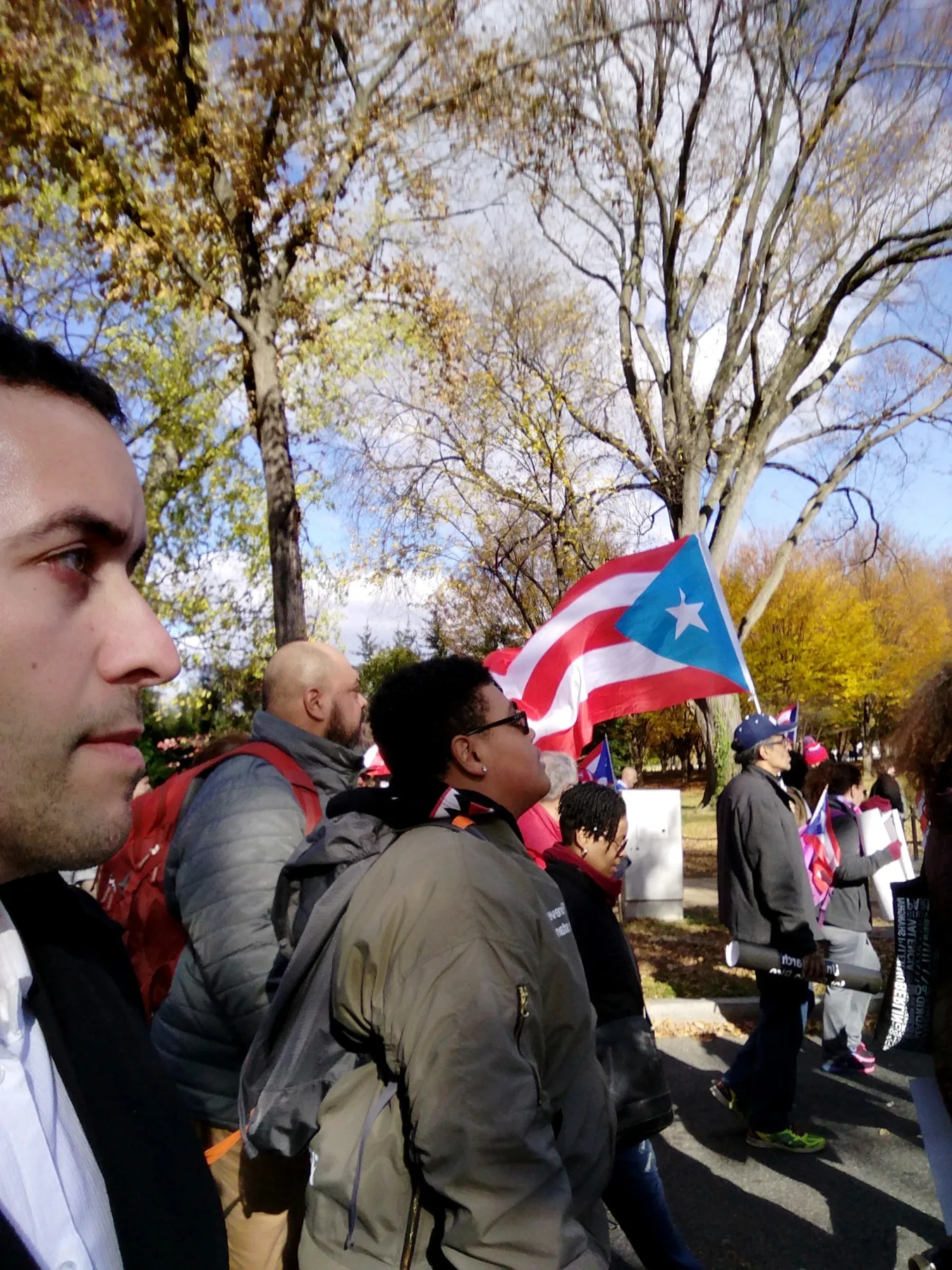 Gabriel Franco walking in a Puerto Rico solidarity march