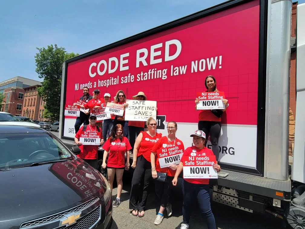 Gabriel Franco joining nurses and healthcare workers at a safe staffing rally