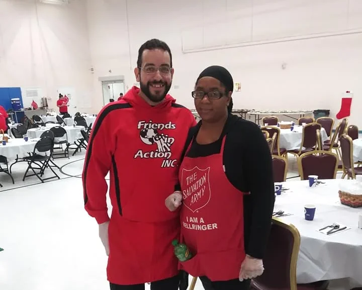 Gabriel Franco volunteering with the Salvation Army to serve meals